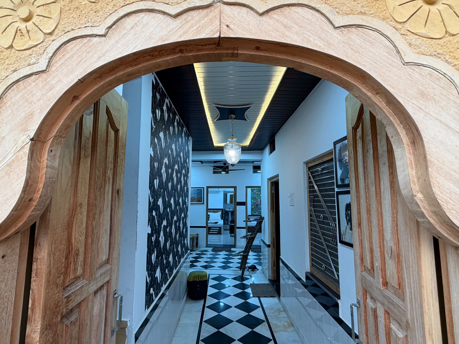 Ornate carved stone arches inside a heritage Rajasthani haveli at Desert Domain